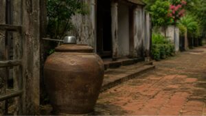 vi sao nhieu gia dinh xua luon co mot chum nuoc truoc cong co phai chi de dung nuoc dung 133136